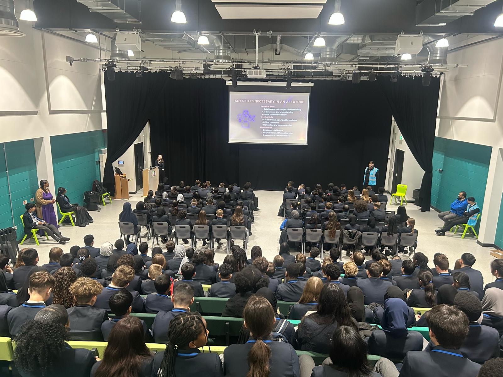 Anna Carina Berkman speaking to a school assembly on AI and future skills